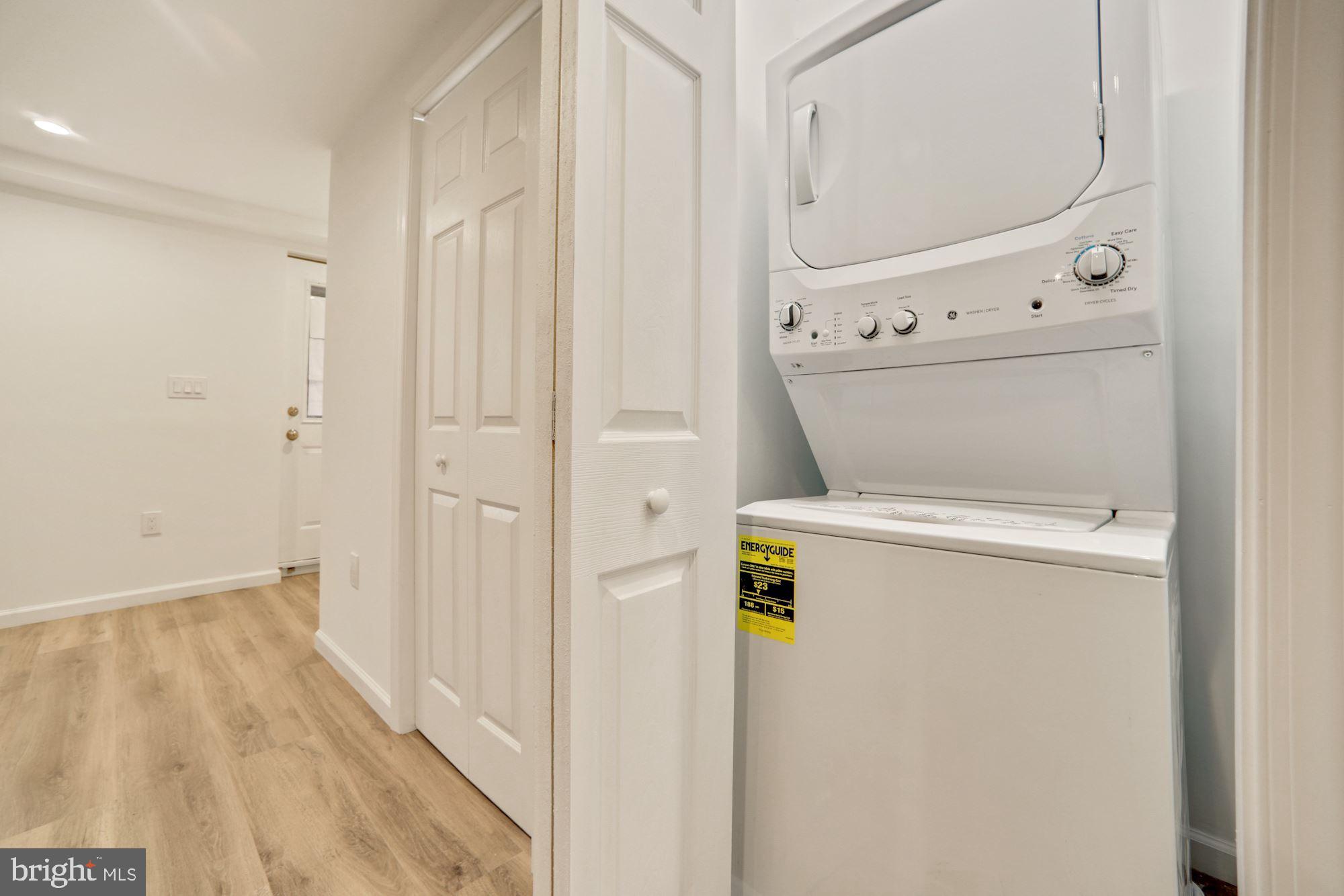 1215 S Street Northwest, Unit B Washington, DC 20009 - Photo 16 of 18 a utility room with dryer and washer