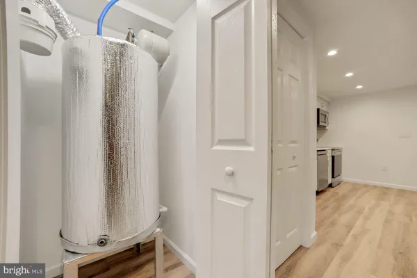 a view of a hallway with closet