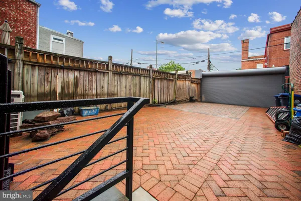 a view of a terrace with seating space