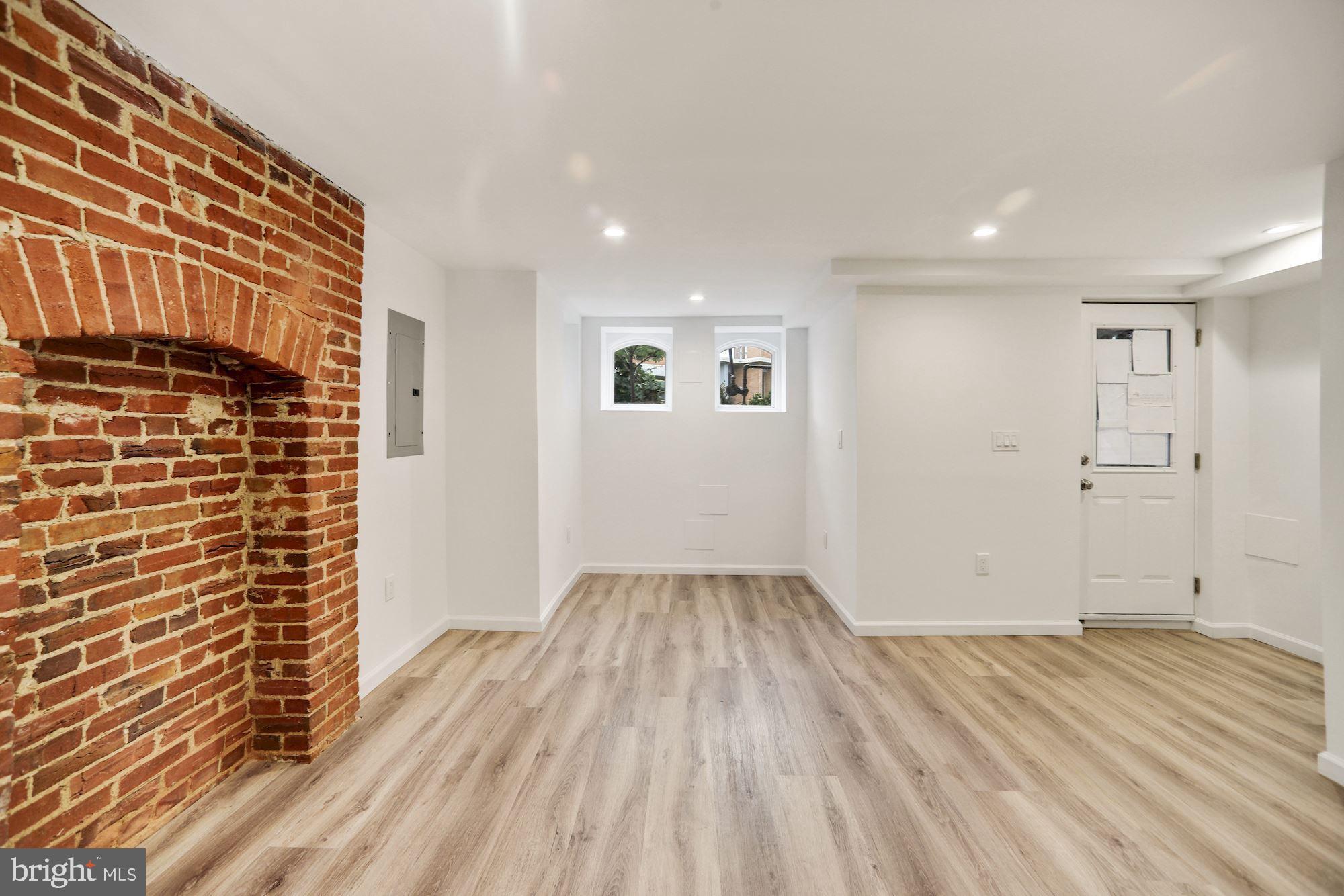 1215 S Street Northwest, Unit B Washington, DC 20009 - Photo 7 of 18 a view of empty room with wooden floor