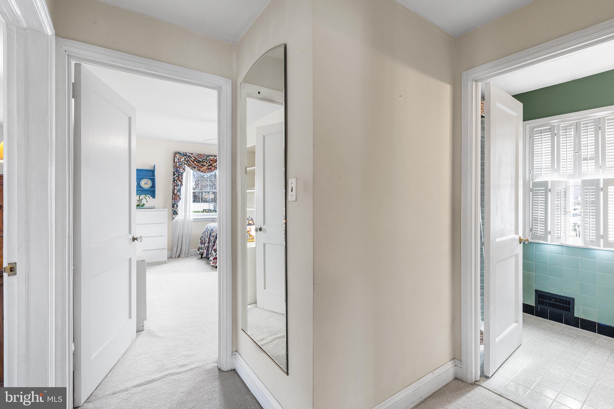 325 Wyndmoor Road Springfield, PA 19064 - Photo 16 of 45 a bathroom with a glass door shower and a sink