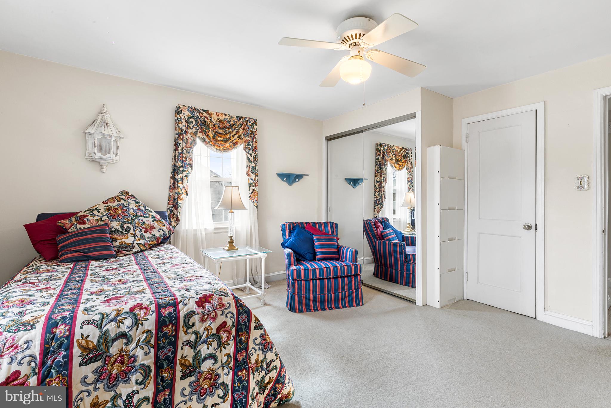 325 Wyndmoor Road Springfield, PA 19064 - Photo 22 of 45 a bedroom with a bed and furniture