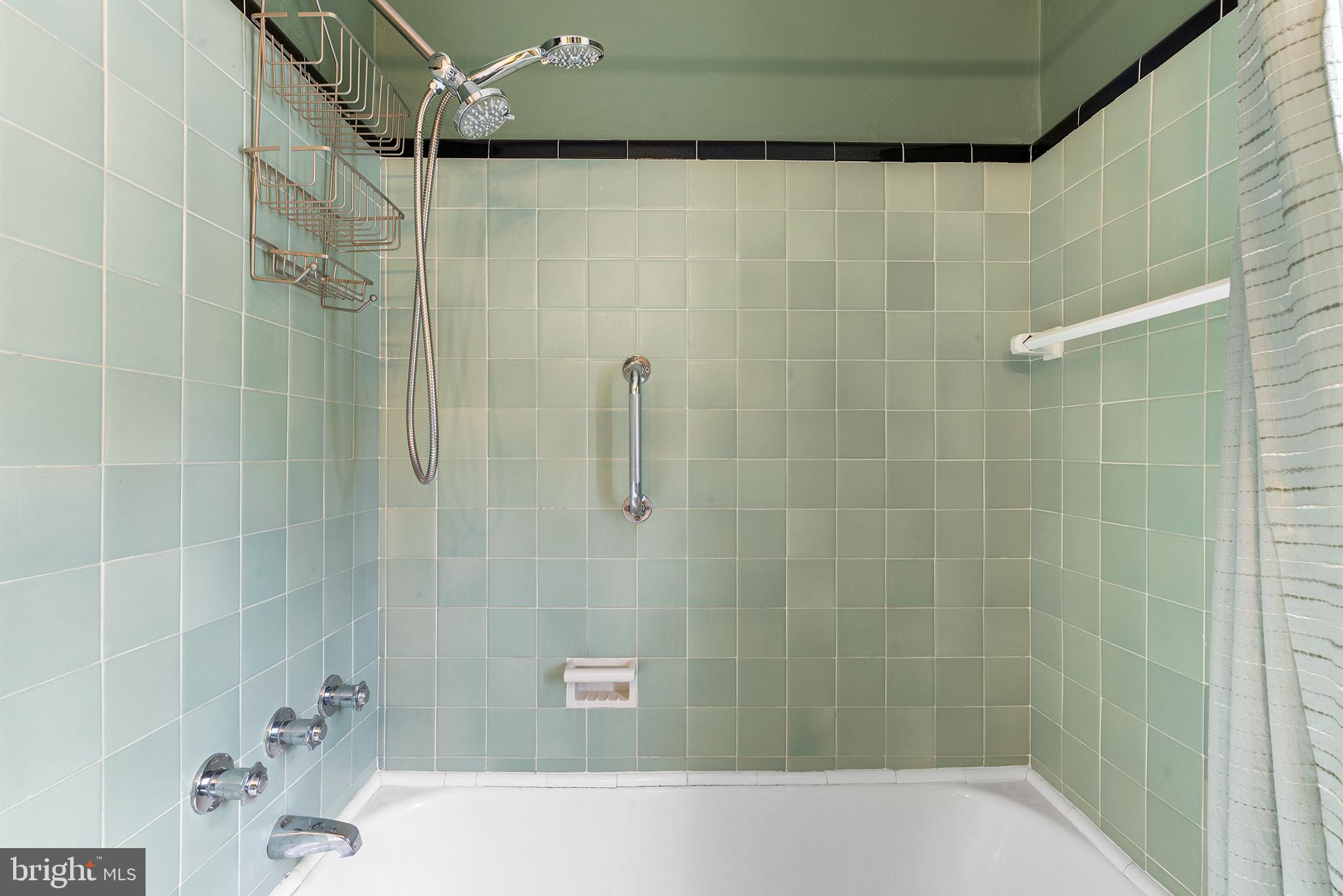 325 Wyndmoor Road Springfield, PA 19064 - Photo 26 of 45 a bathroom with a bathtub and shower