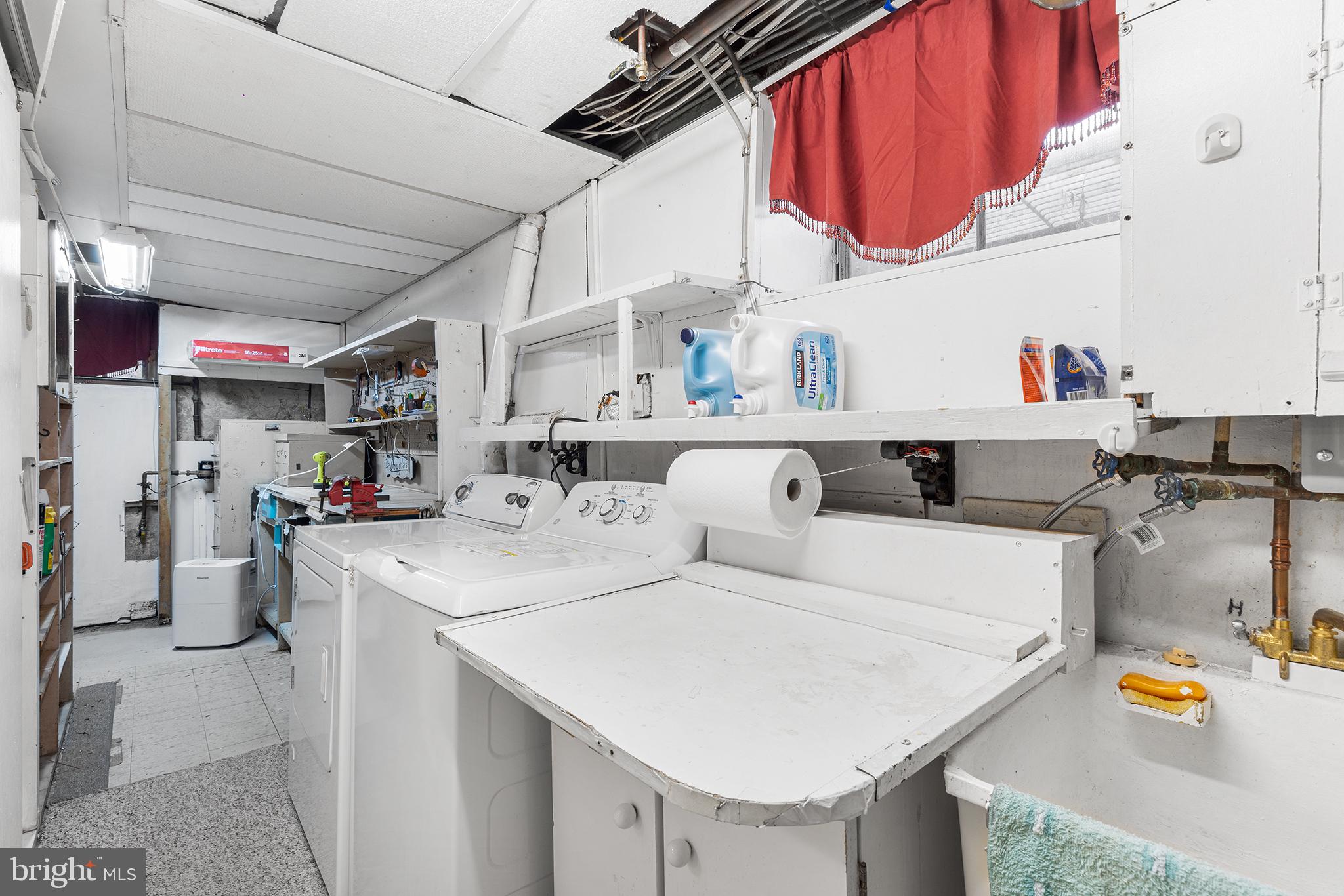 325 Wyndmoor Road Springfield, PA 19064 - Photo 29 of 45 a utility room with dryer and washer