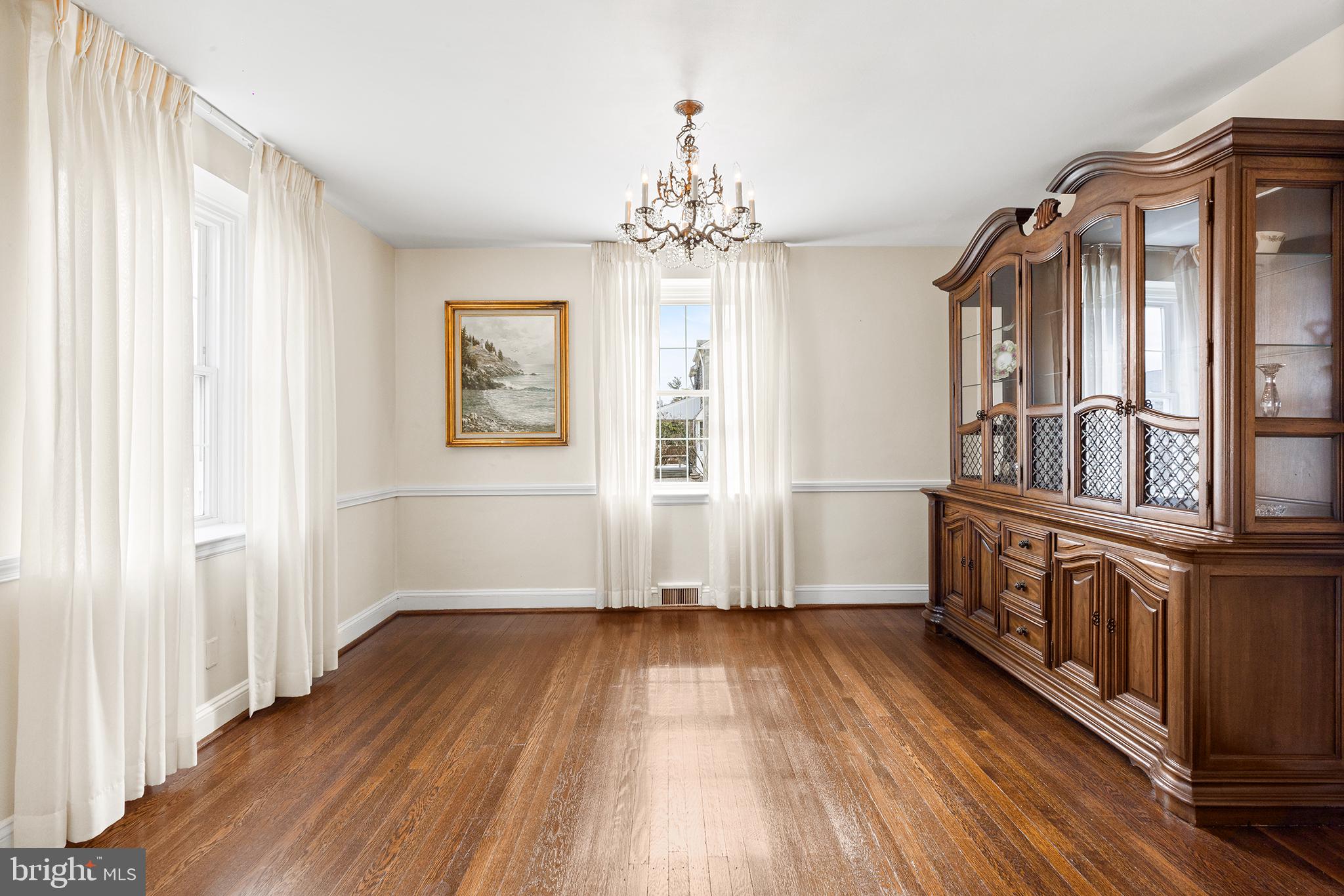325 Wyndmoor Road Springfield, PA 19064 - Photo 6 of 45 wooden floor in an empty room with a window