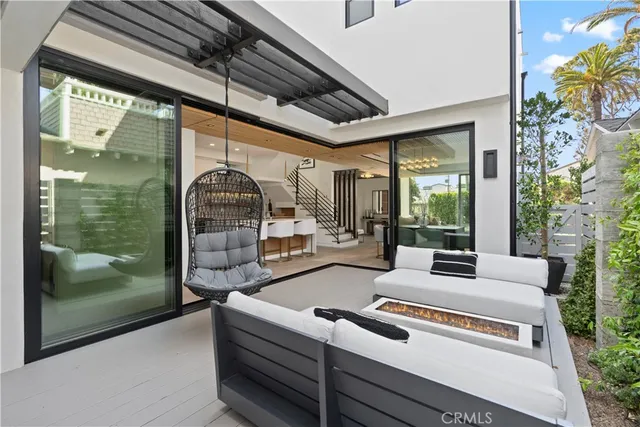 a outdoor living space with patio furniture and a potted plant