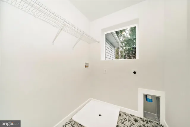 a view of a balcony with wooden floor and fence