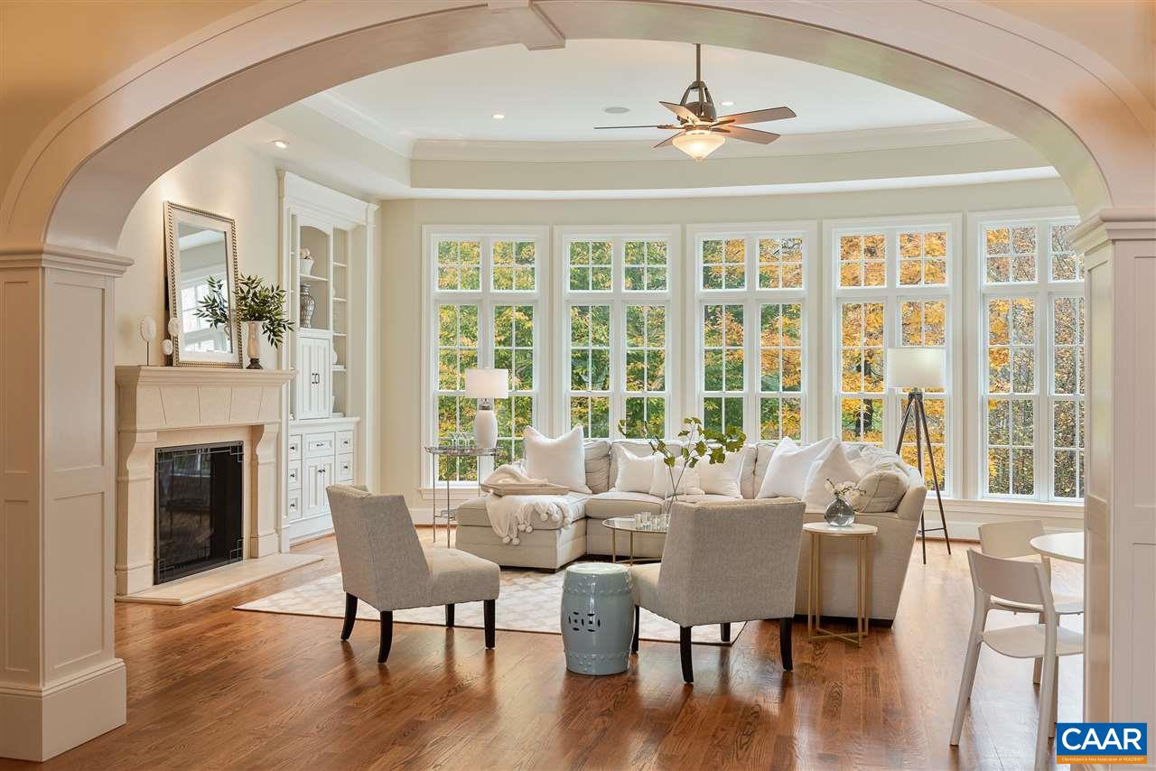 3104 Darby Road Keswick, VA 22947 - Photo 1 of 43 a view of a dining room with furniture window and wooden floor