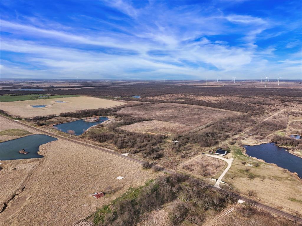 9784 County Line Road South Mount Calm, TX 76673 - Photo 13 of 15 a view of a ocean with beach
