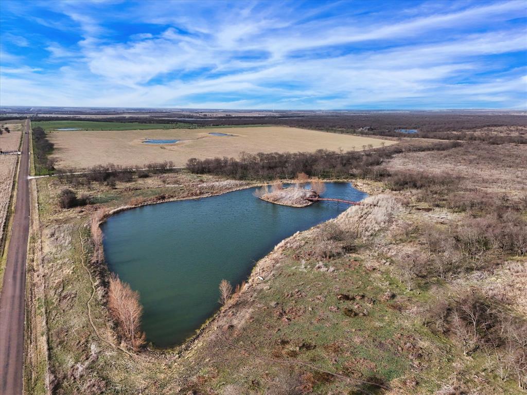 9784 County Line Road South Mount Calm, TX 76673 - Photo 15 of 15 a view of a lake with outdoor space