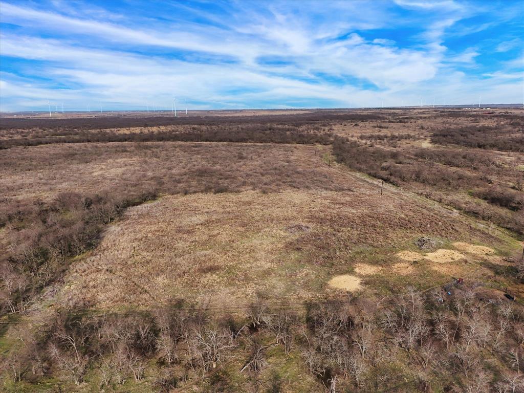 9784 County Line Road South Mount Calm, TX 76673 - Photo 4 of 15 an aerial view of residential houses with outdoor space