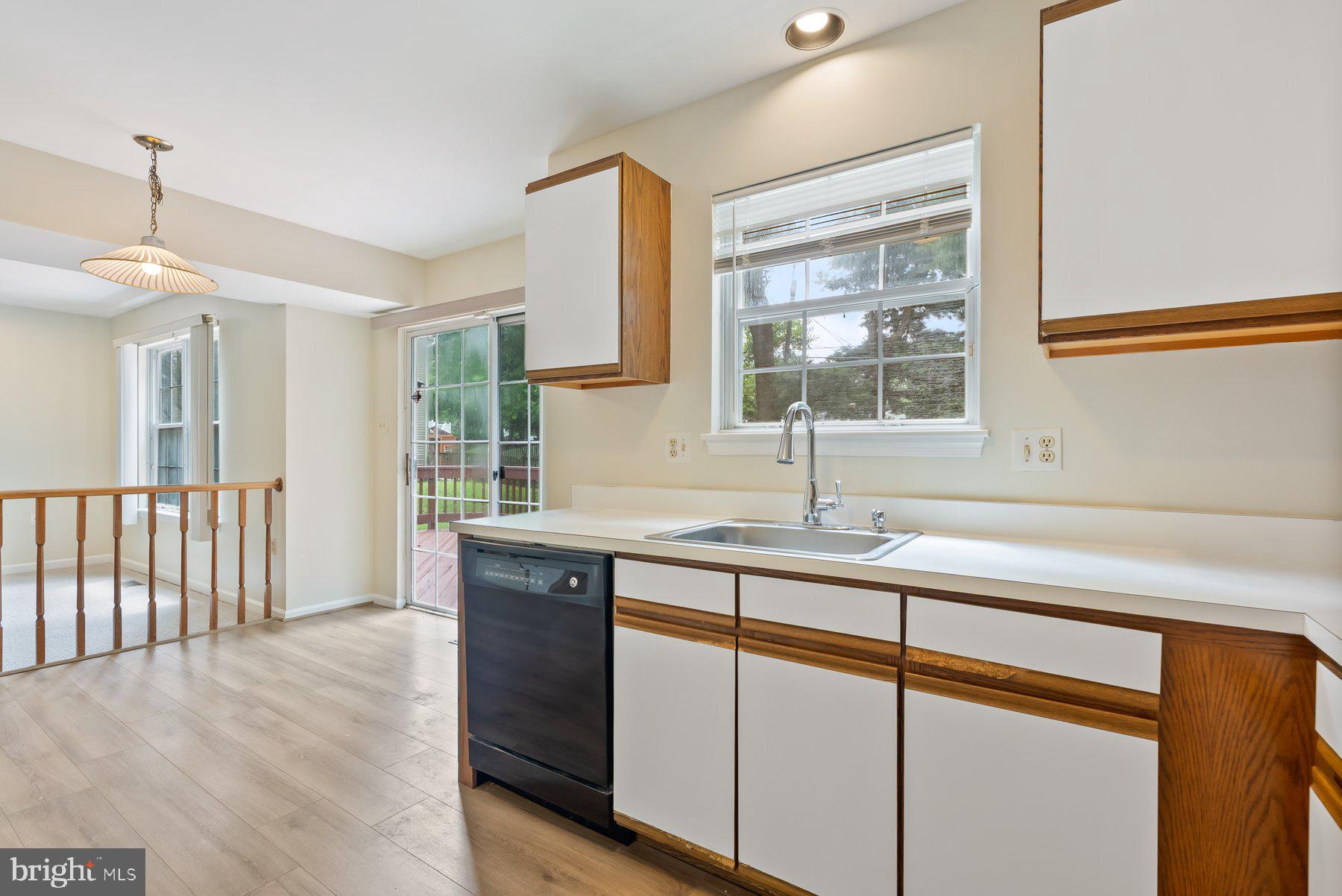 13 Bellinger Court Reisterstown, MD 21136 - Photo 14 of 37 a kitchen with a sink and window