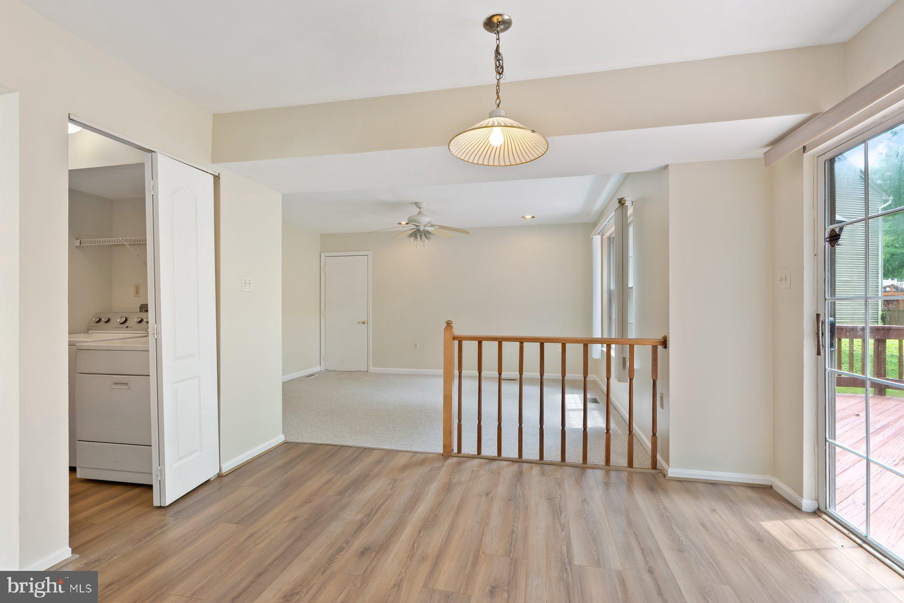 13 Bellinger Court Reisterstown, MD 21136 - Photo 15 of 37 wooden floor in an empty room with a window