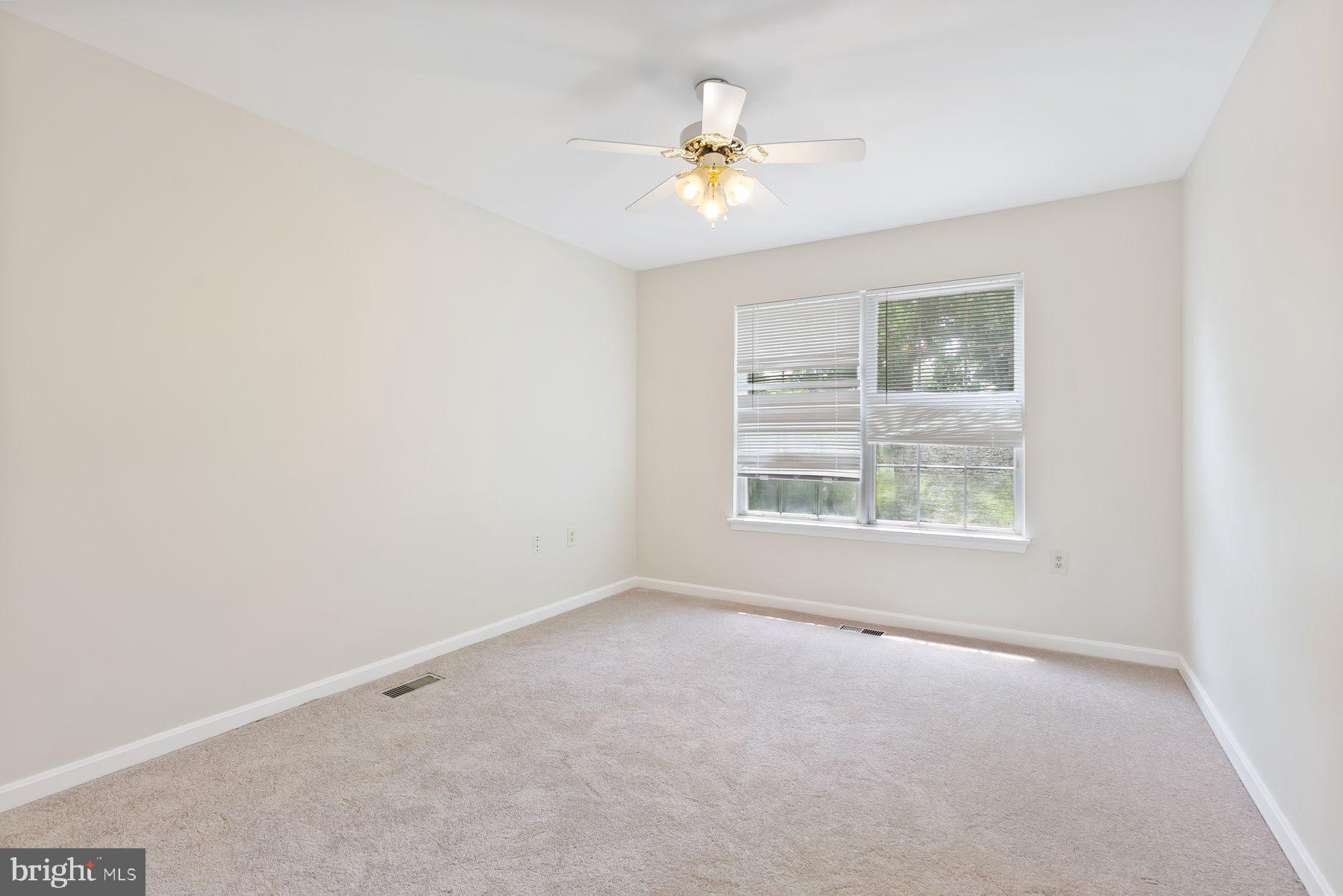 13 Bellinger Court Reisterstown, MD 21136 - Photo 20 of 37 an empty room with a window