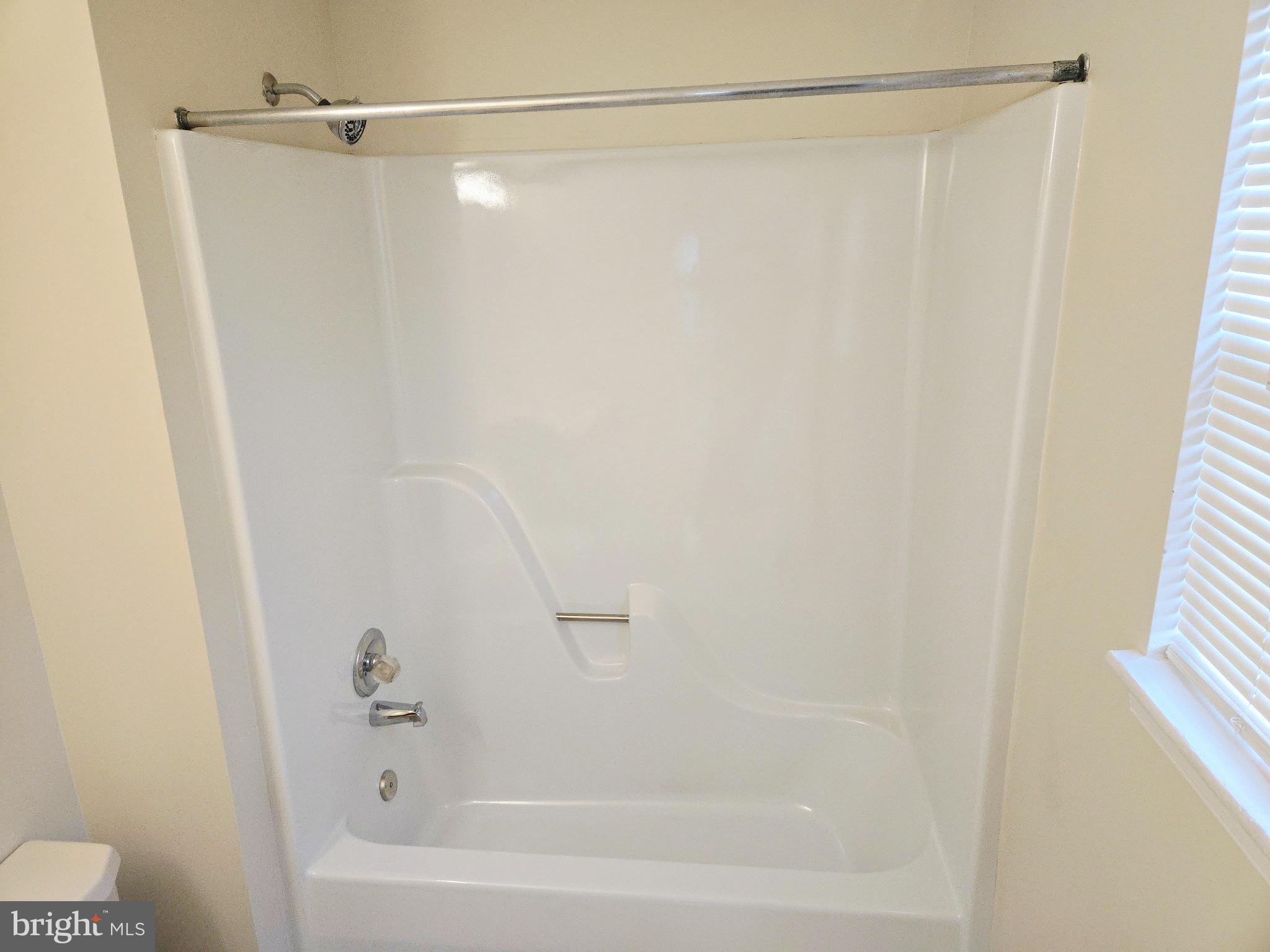 13 Bellinger Court Reisterstown, MD 21136 - Photo 24 of 37 a bathroom with a shower and a bath tub