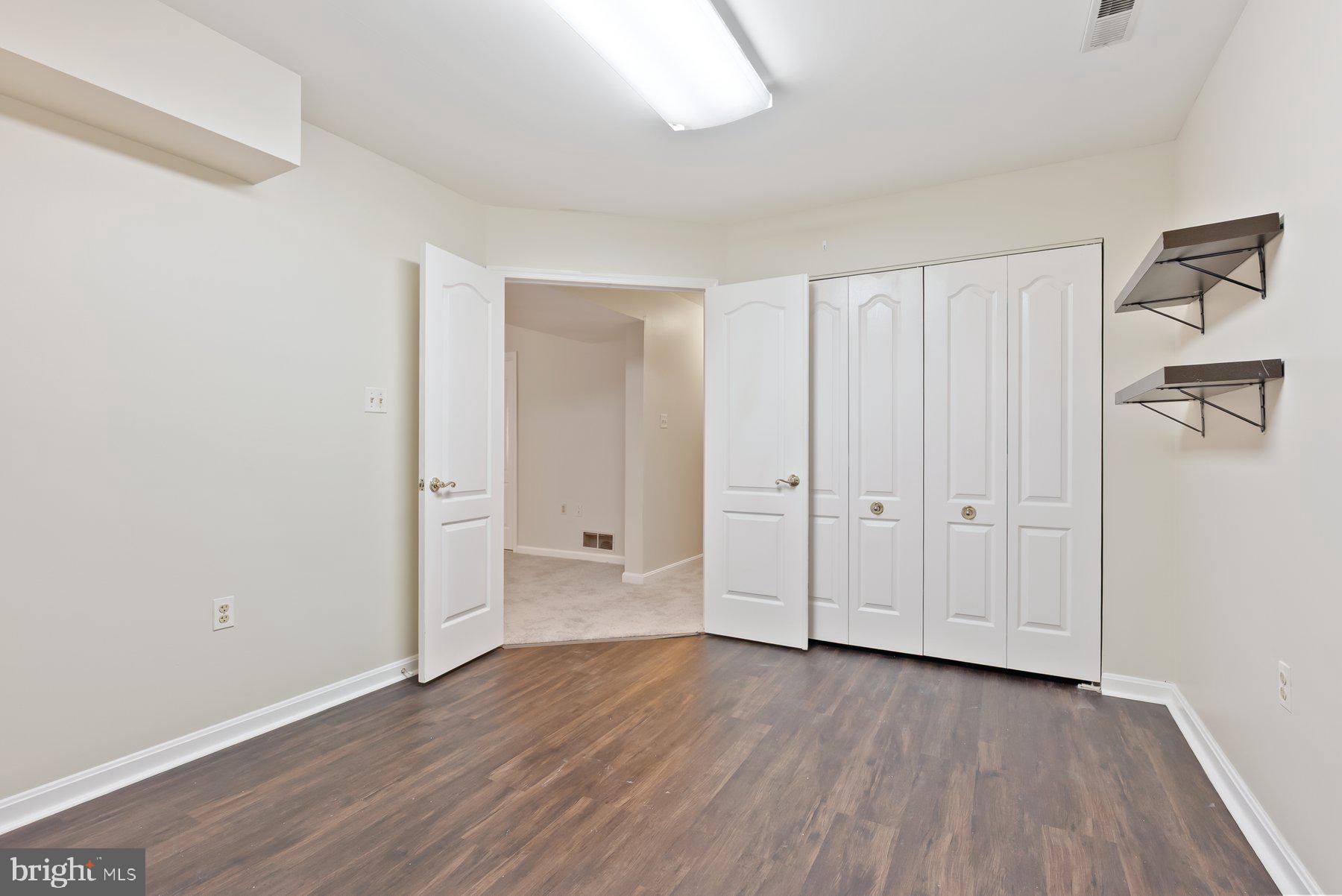 13 Bellinger Court Reisterstown, MD 21136 - Photo 29 of 37 a view of a room with wooden floor