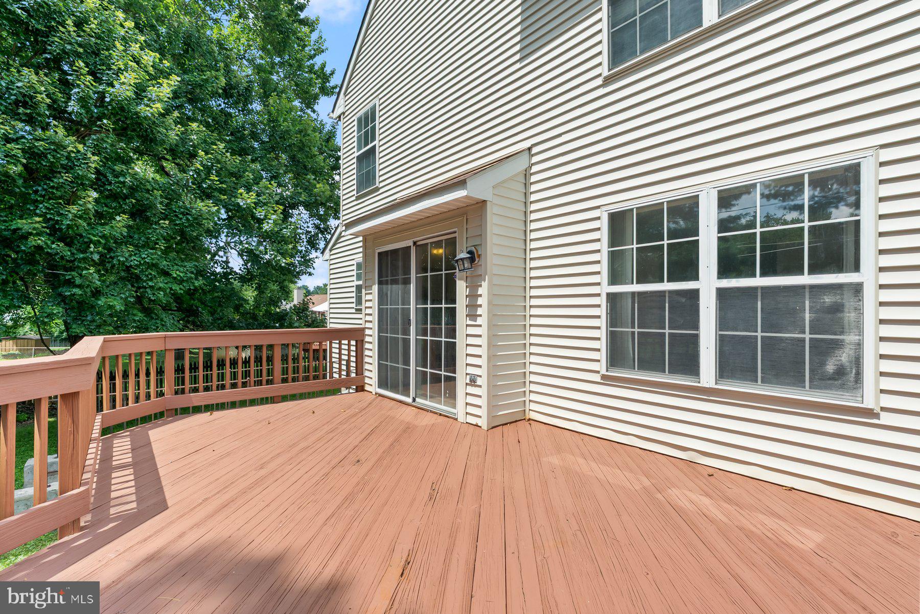 13 Bellinger Court Reisterstown, MD 21136 - Photo 35 of 37 a view of a house with wooden deck