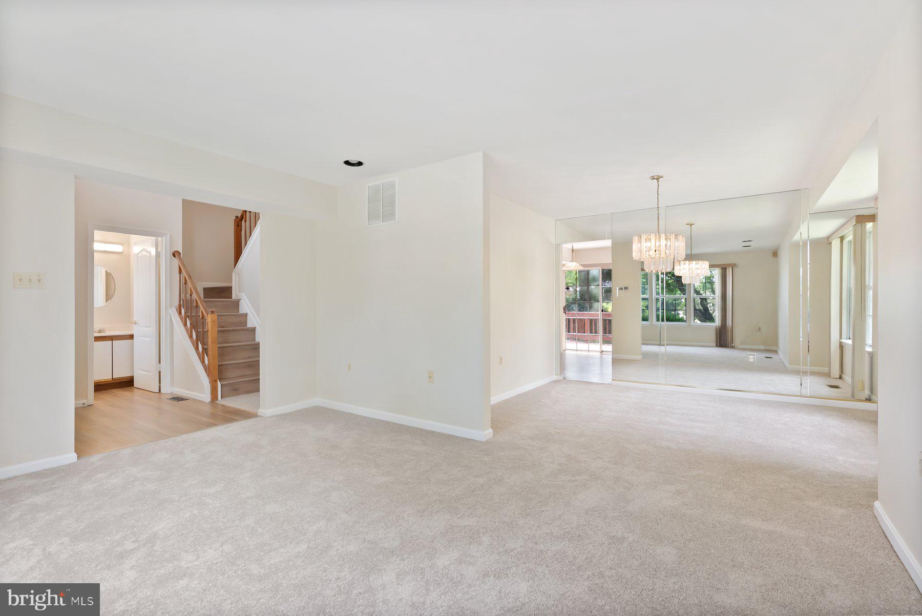 13 Bellinger Court Reisterstown, MD 21136 - Photo 6 of 37 a view of an empty room with a fireplace