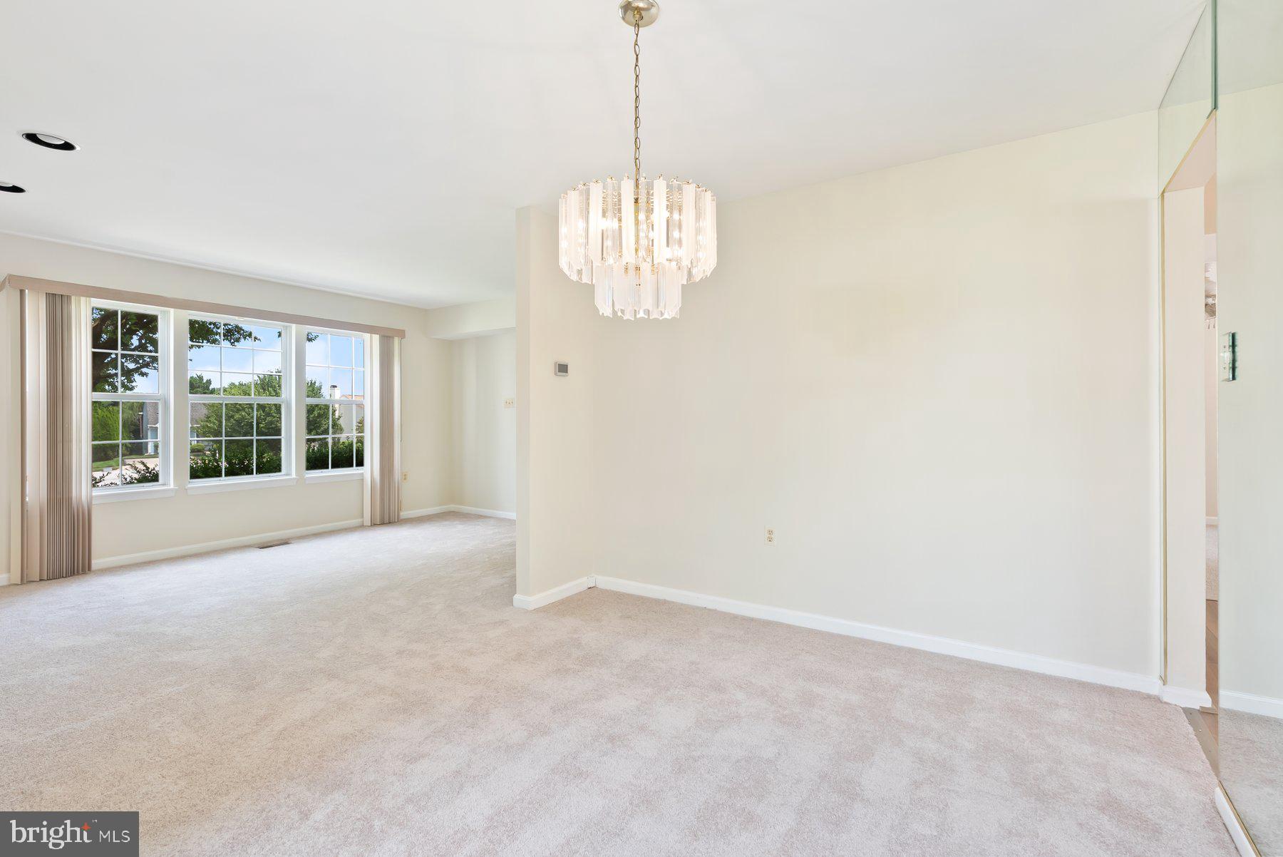 13 Bellinger Court Reisterstown, MD 21136 - Photo 8 of 37 a view of an empty room with a window