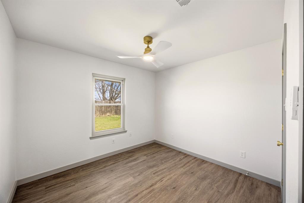 617 Reed Street Roanoke, TX 76262 - Photo 16 of 35 wooden floor in an empty room