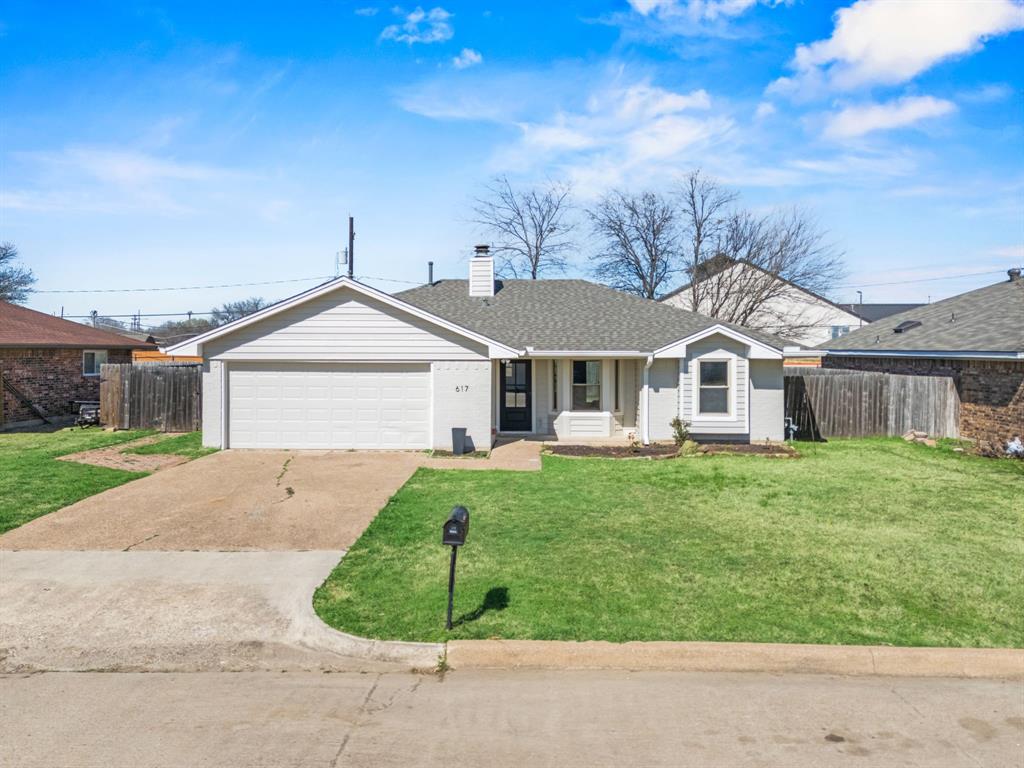 617 Reed Street Roanoke, TX 76262 - Photo 2 of 35 a front view of a house with a garden and porch