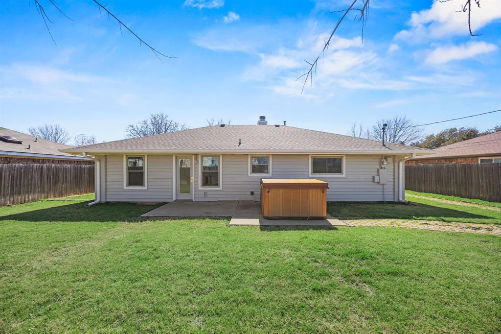 617 Reed Street Roanoke, TX 76262 - Photo 24 of 35 a view of a house with a yard