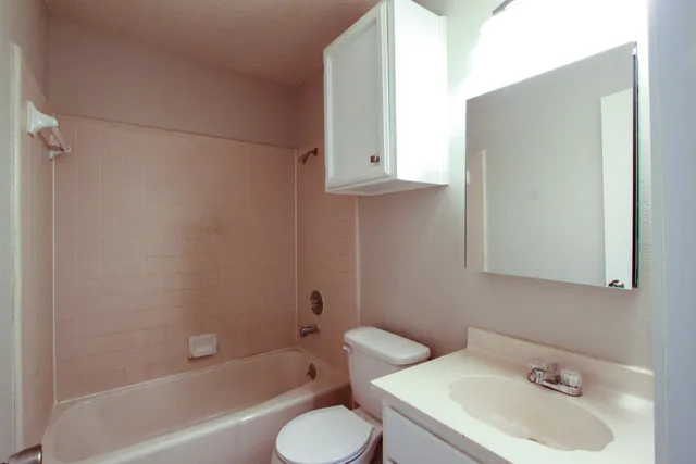 a view of backyard with a deck