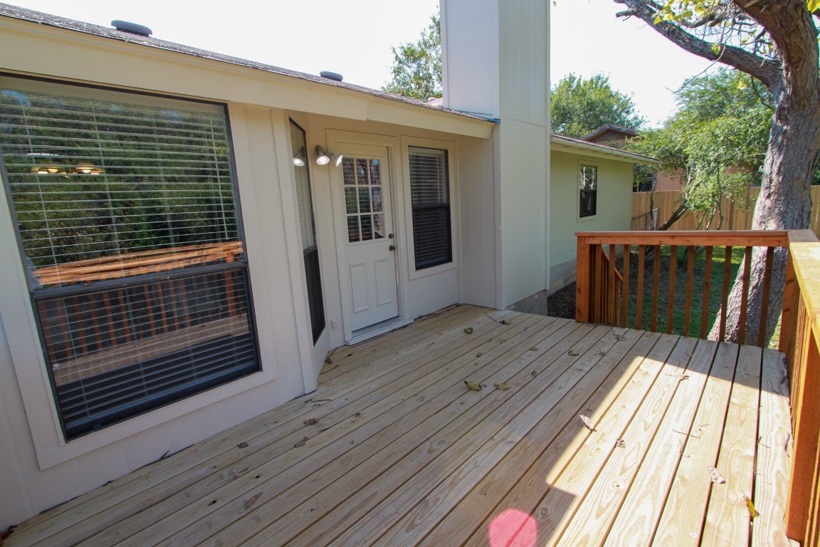 605 Timber Trail Cedar Park, TX 78613 - Photo 31 of 36 a view of backyard with a deck