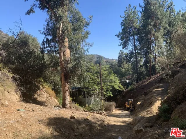 a view of snow on a road