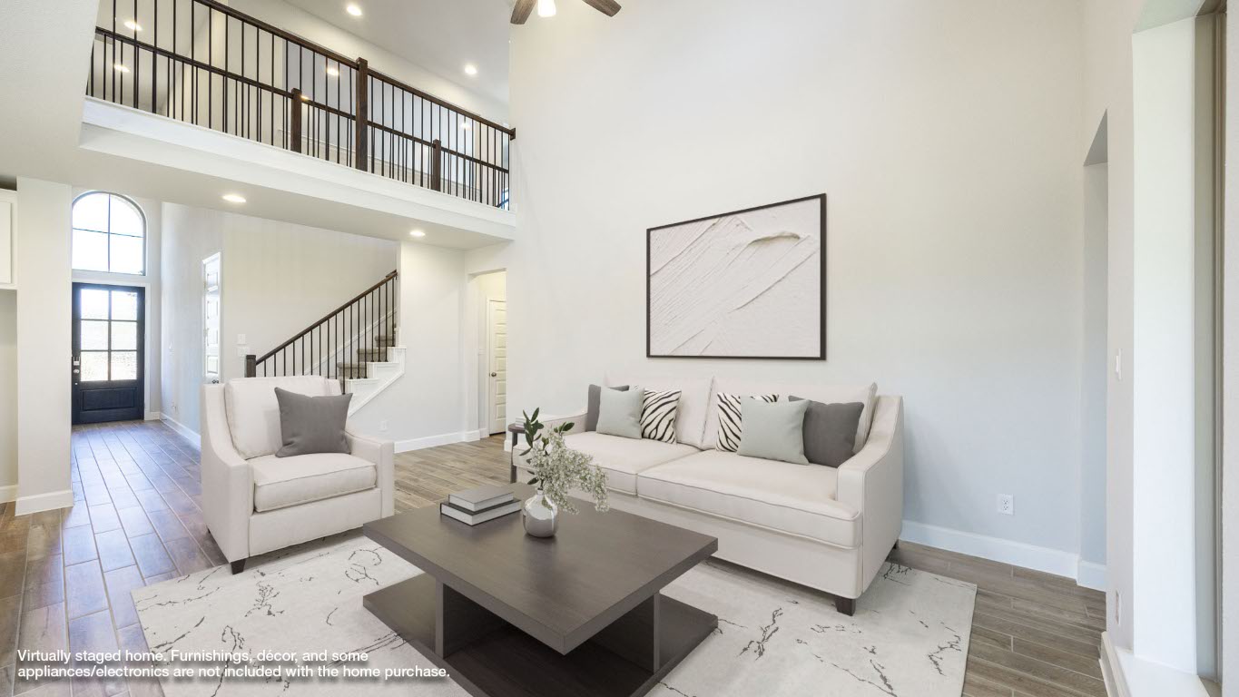213 Adali Avenue Georgetown, TX 78633 - Photo 4 of 16 Living room featuring wood finished floors, a high ceiling, recessed lighting, and stairway