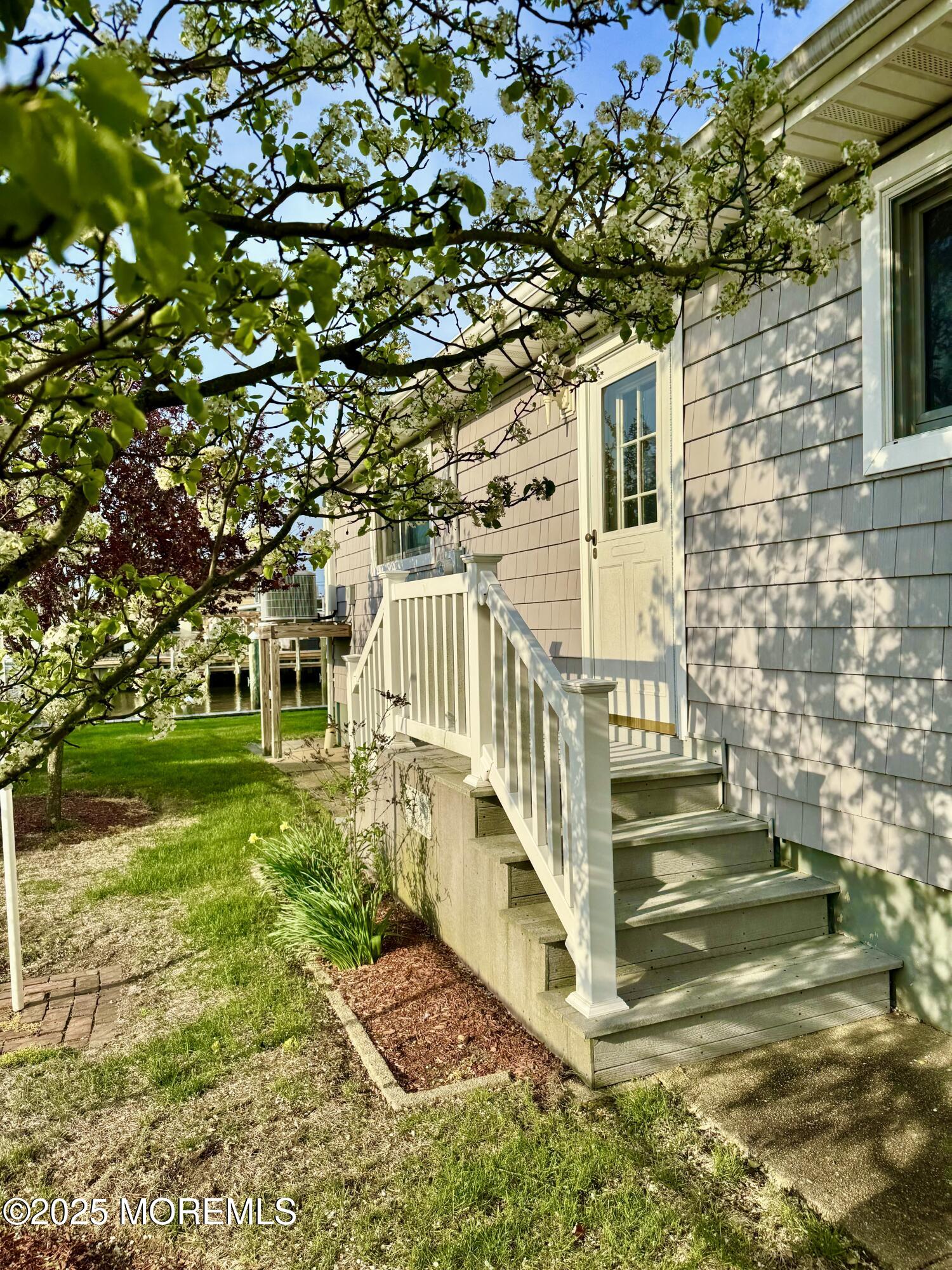 922 Capstan Drive Forked River, NJ 08731 - Photo 17 of 26 a view of a house with a yard