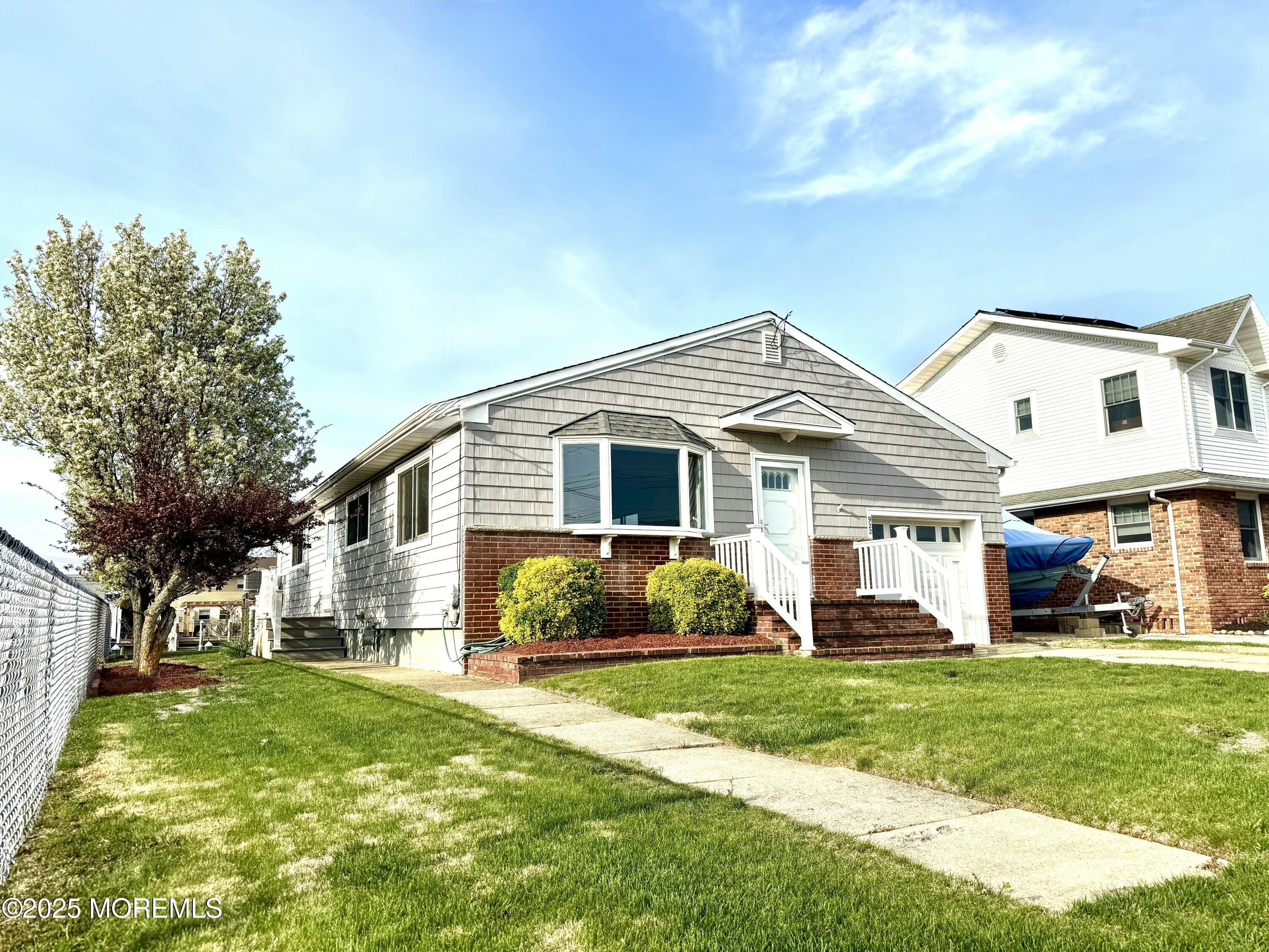 922 Capstan Drive Forked River, NJ 08731 - Photo 3 of 26 a view of a yard in front of house