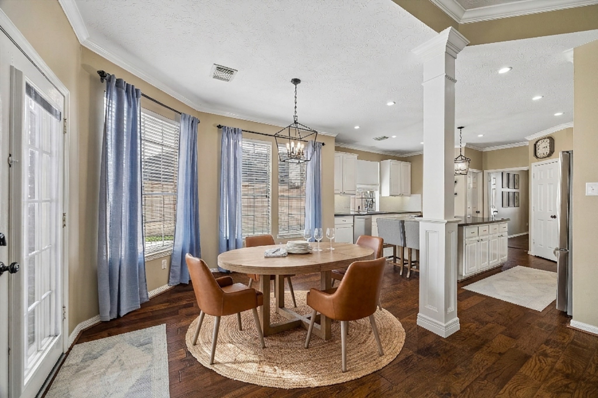 5310 Summerland Ridge Court Houston, TX 77041 - Photo 16 of 46 a dining room with furniture window and wooden floor