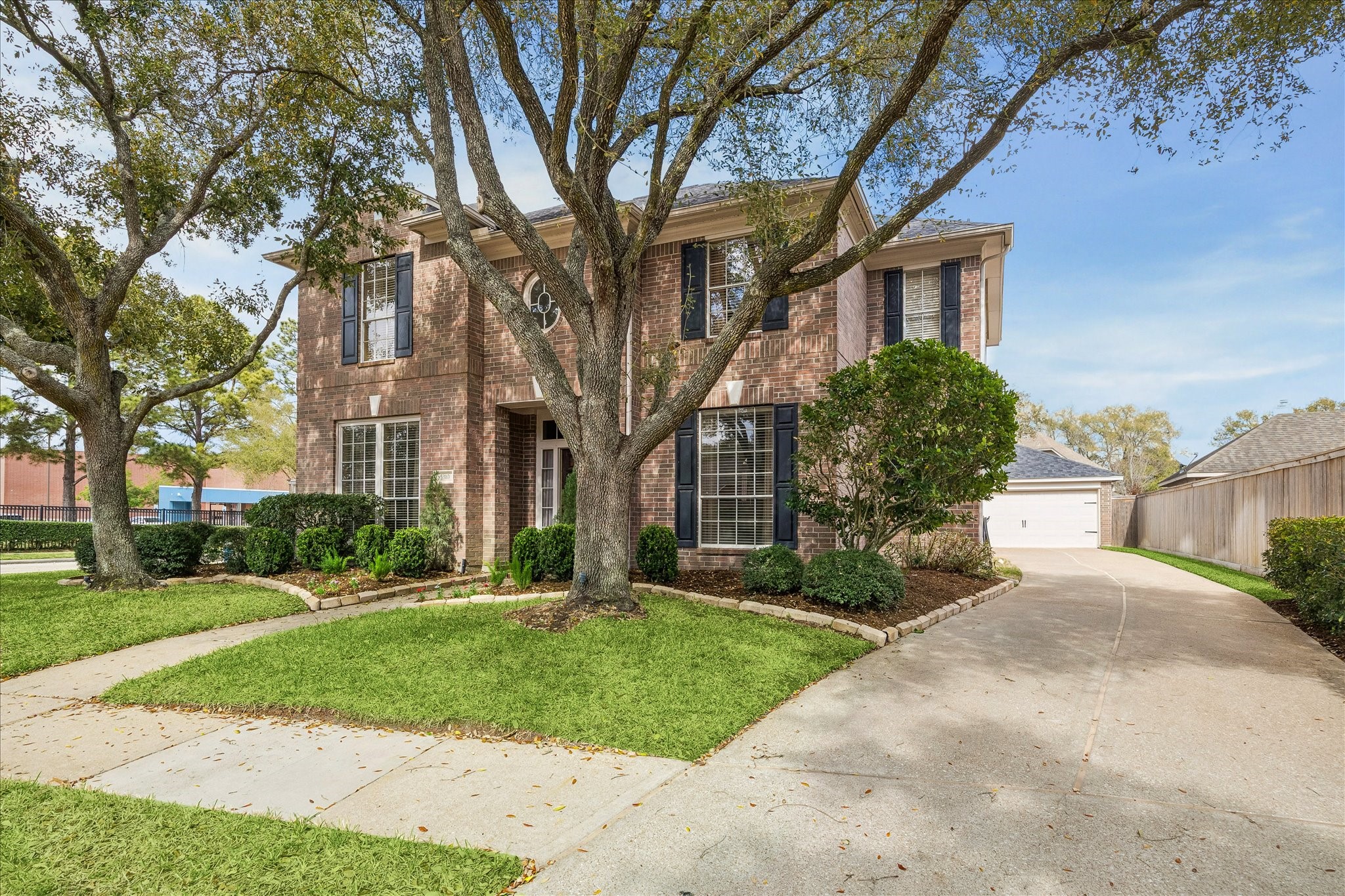 5310 Summerland Ridge Court Houston, TX 77041 - Photo 3 of 46 This home has a long driveway offering plenty of parking and a detached garage.