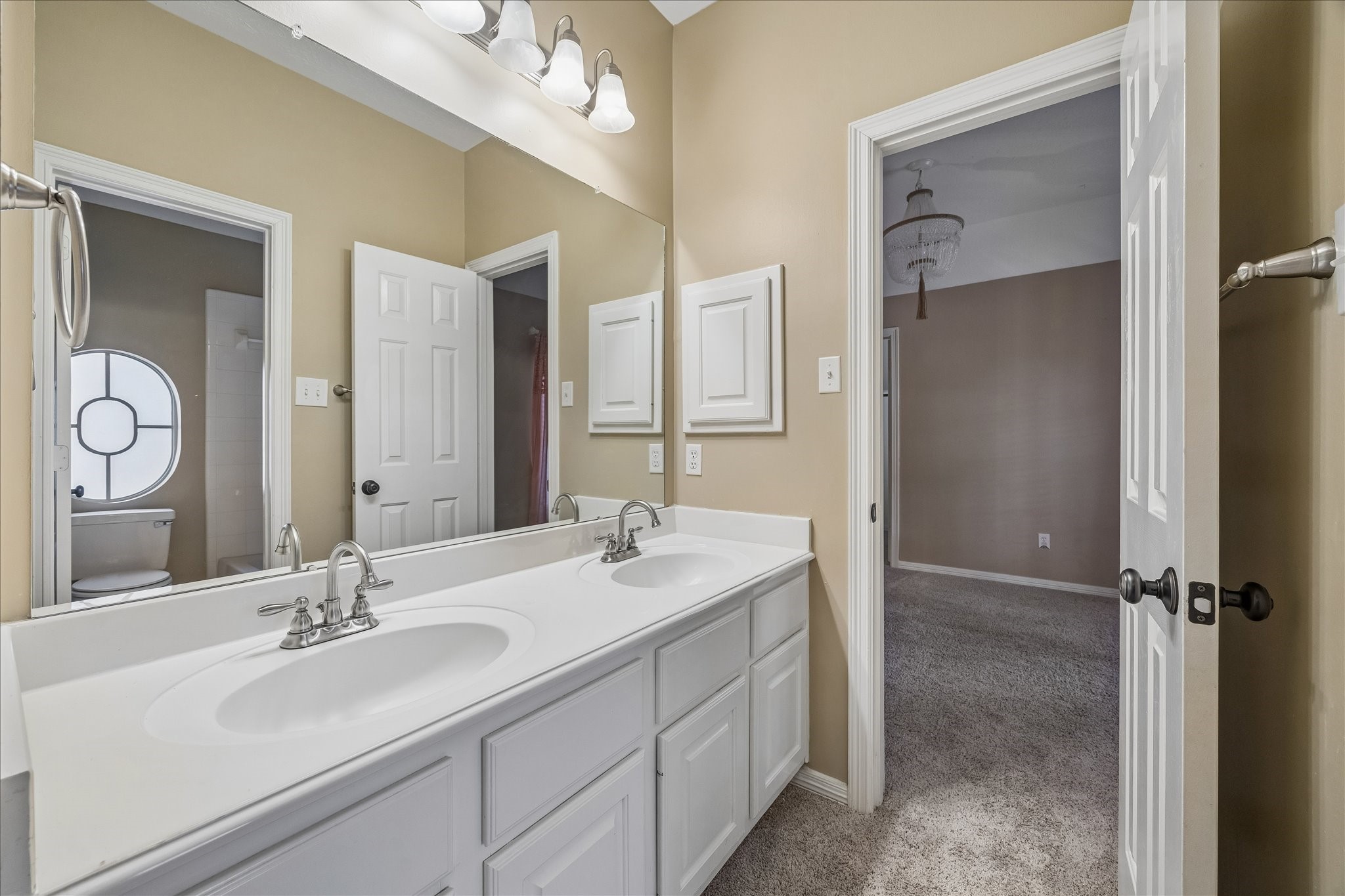 5310 Summerland Ridge Court Houston, TX 77041 - Photo 31 of 46 a bathroom with a double vanity sink mirror and double