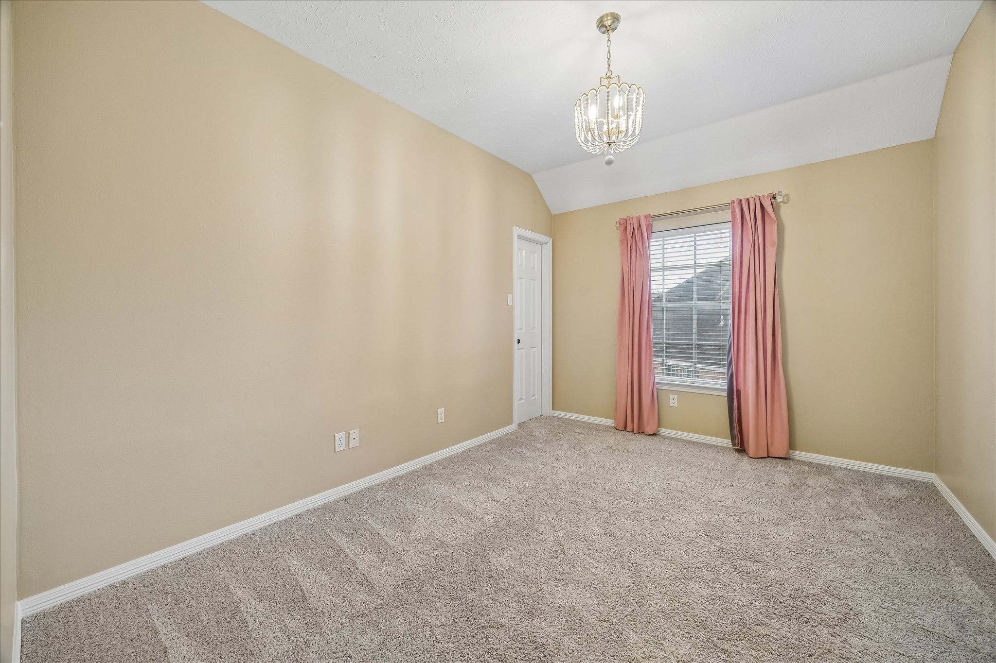 5310 Summerland Ridge Court Houston, TX 77041 - Photo 33 of 46 a view of a chandelier and window in a room