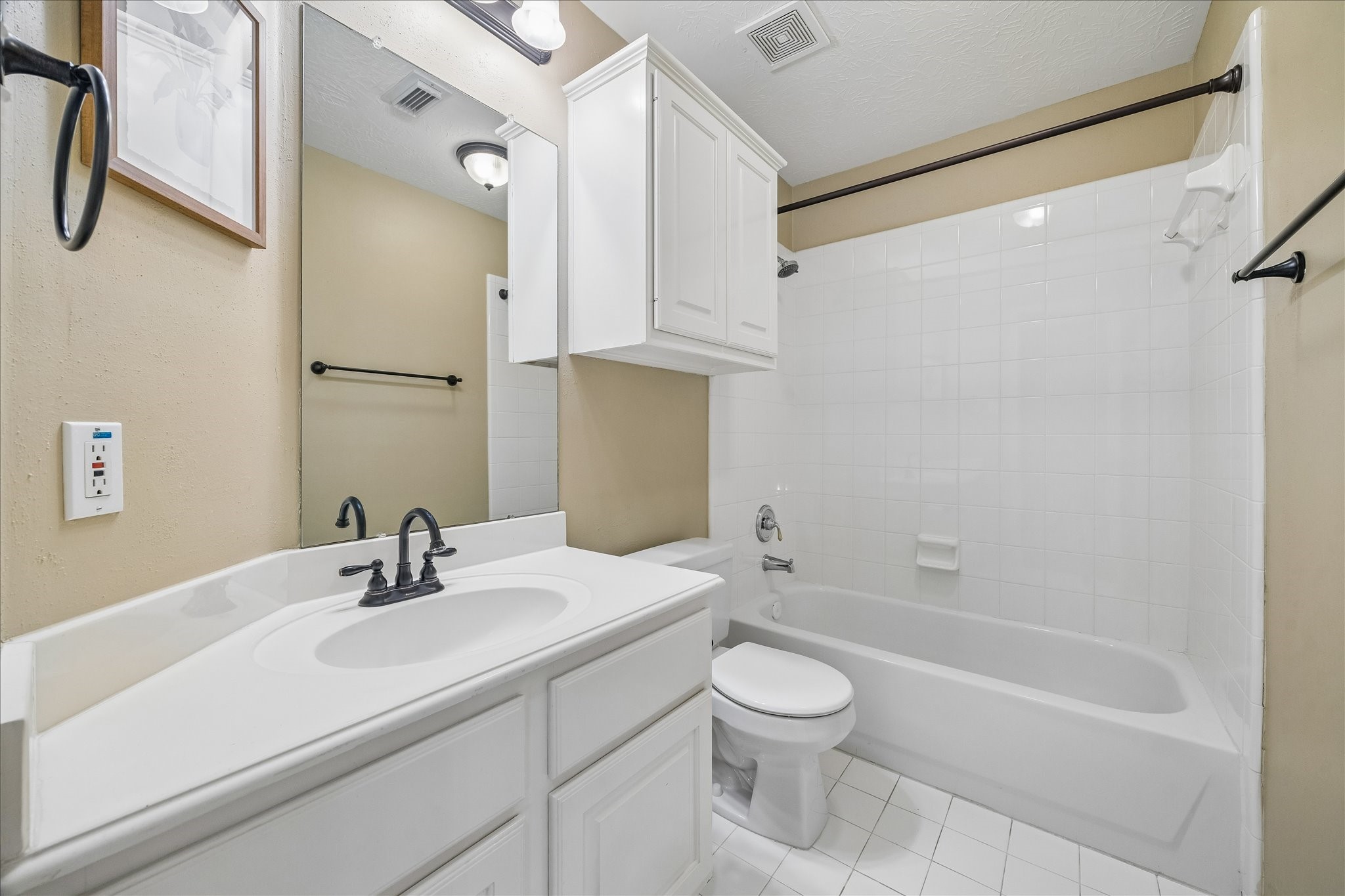 5310 Summerland Ridge Court Houston, TX 77041 - Photo 34 of 46 a bathroom with a sink a toilet and shower
