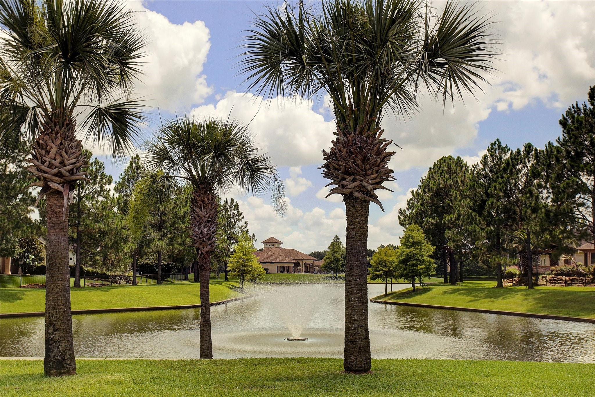 5310 Summerland Ridge Court Houston, TX 77041 - Photo 46 of 46 The neighborhood has beautifully landscaped ponds with fountains, surrounded by lush greenery and plenty of trees. The setting is tranquil, offering a picturesque view perfect for a relaxing home environment.