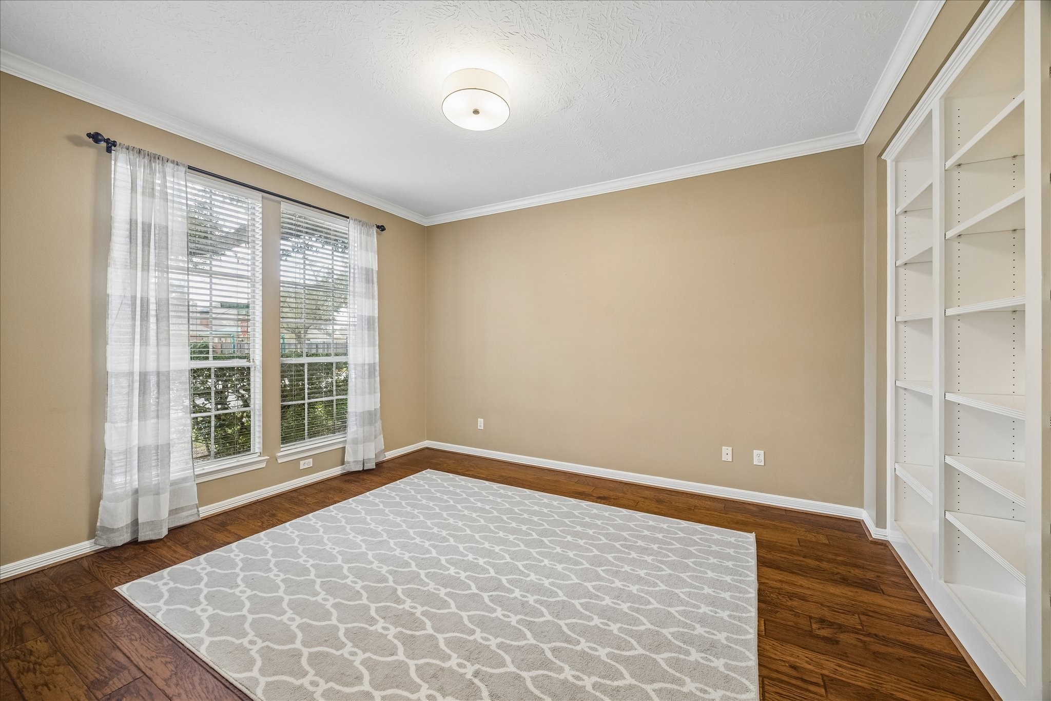 5310 Summerland Ridge Court Houston, TX 77041 - Photo 7 of 46 a view of empty room with wooden floor and fan