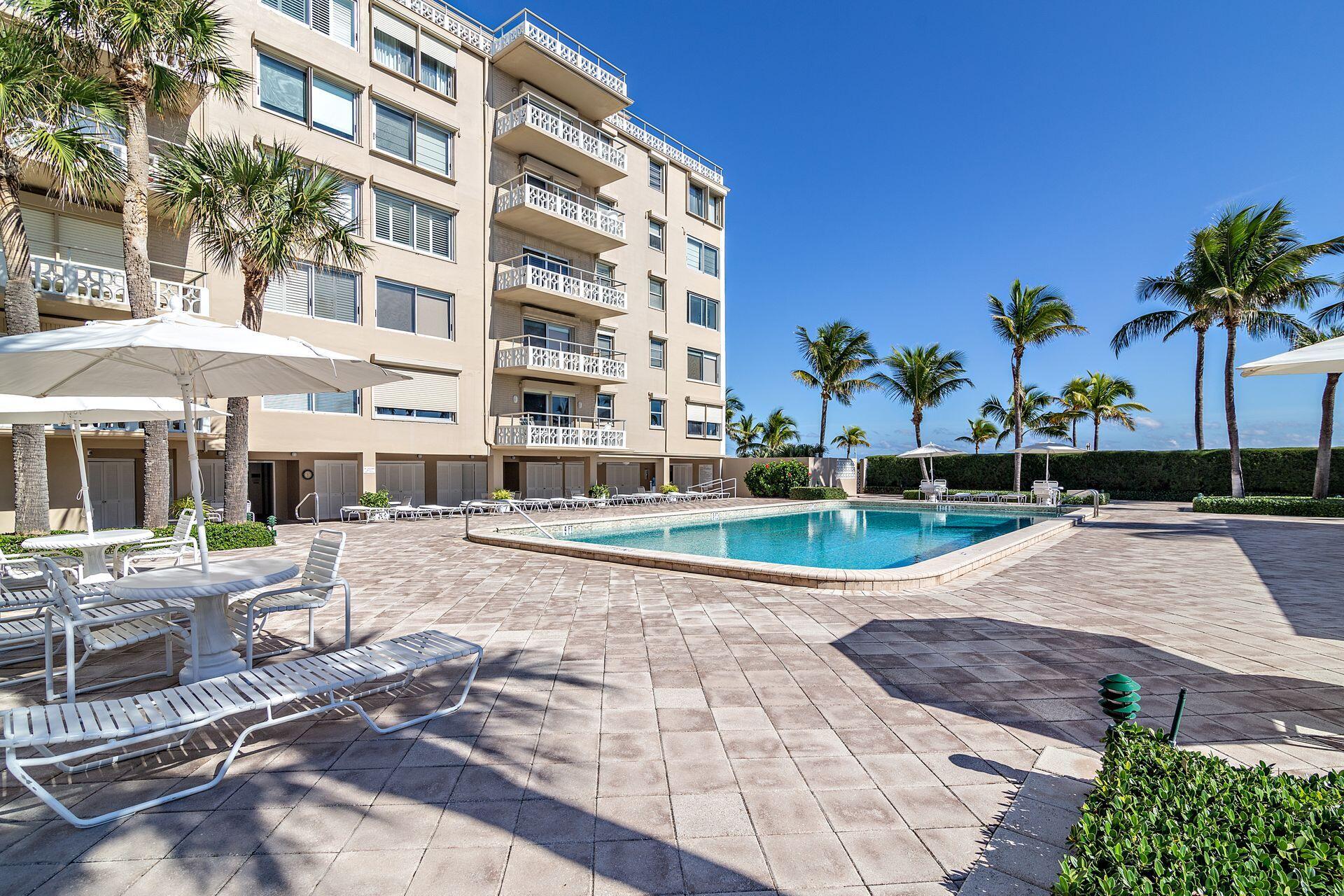 170 North Ocean Boulevard, Unit 409 Palm Beach, FL 33480 - Photo 26 of 34 a view of a building with garden