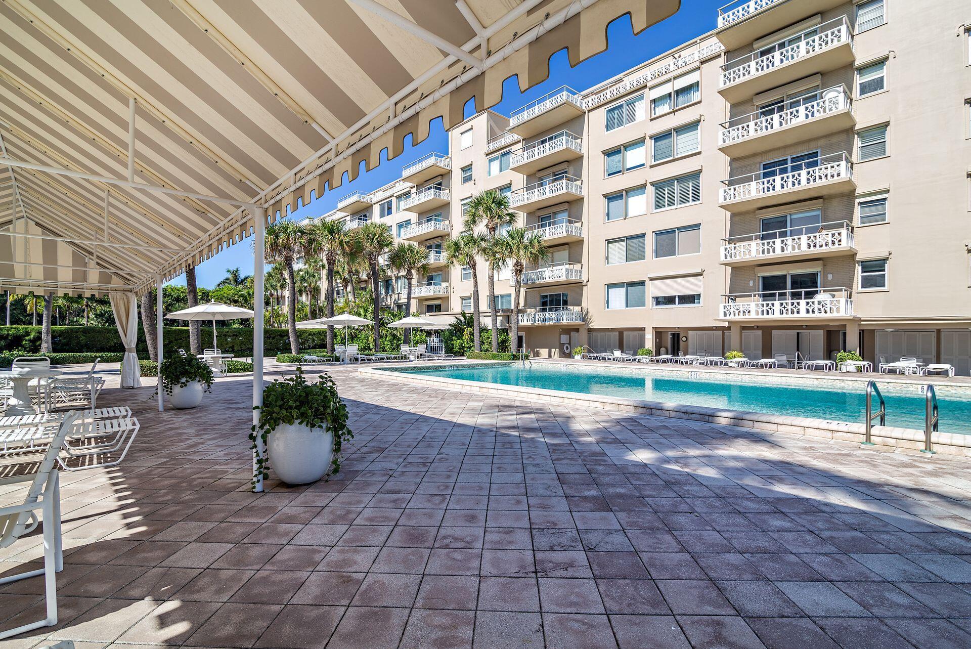 170 North Ocean Boulevard, Unit 409 Palm Beach, FL 33480 - Photo 28 of 34 a view of yard with patio