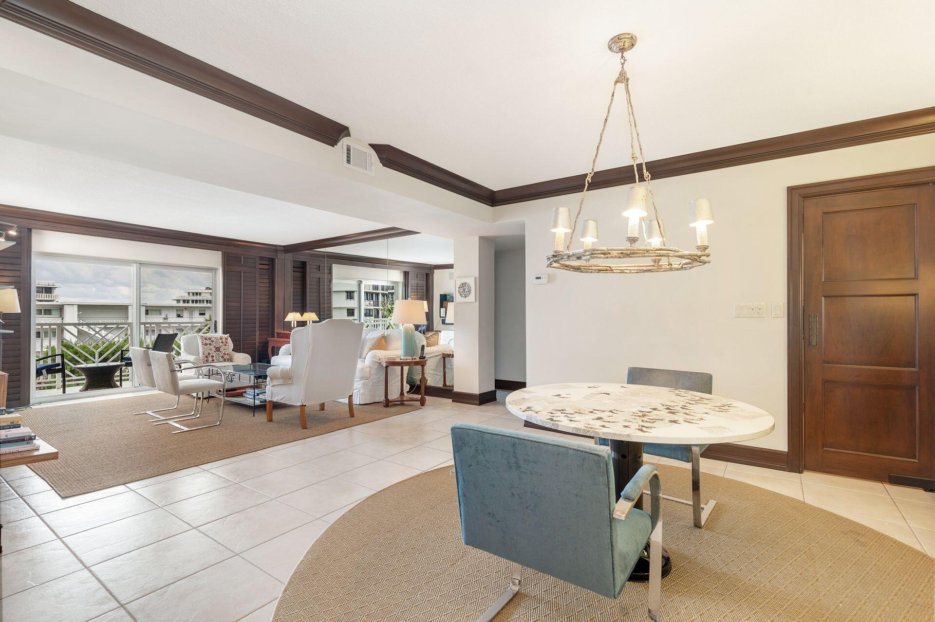 170 North Ocean Boulevard, Unit 409 Palm Beach, FL 33480 - Photo 3 of 34 a view of a dining room with furniture window and outside view