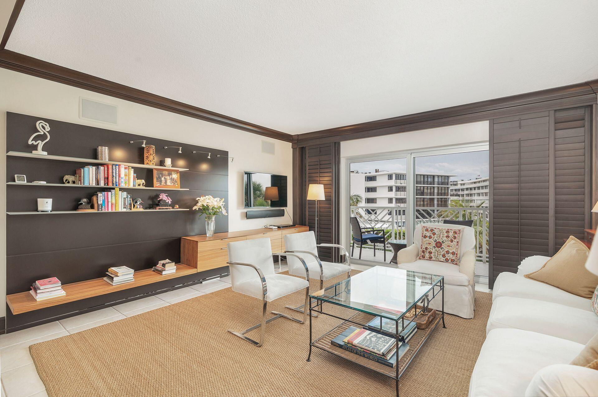 170 North Ocean Boulevard, Unit 409 Palm Beach, FL 33480 - Photo 7 of 34 a living room with furniture