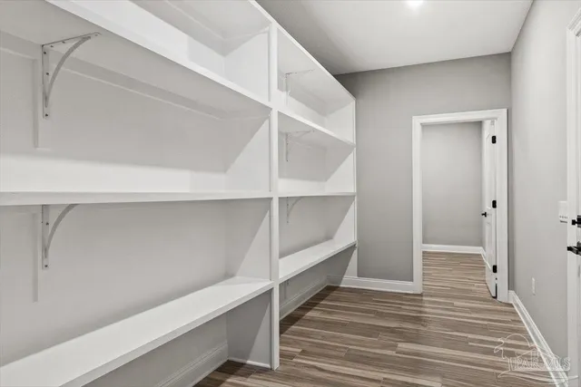 a view of an empty walk in closet