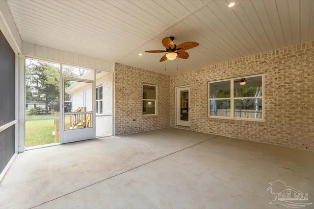 a view of a park with large trees