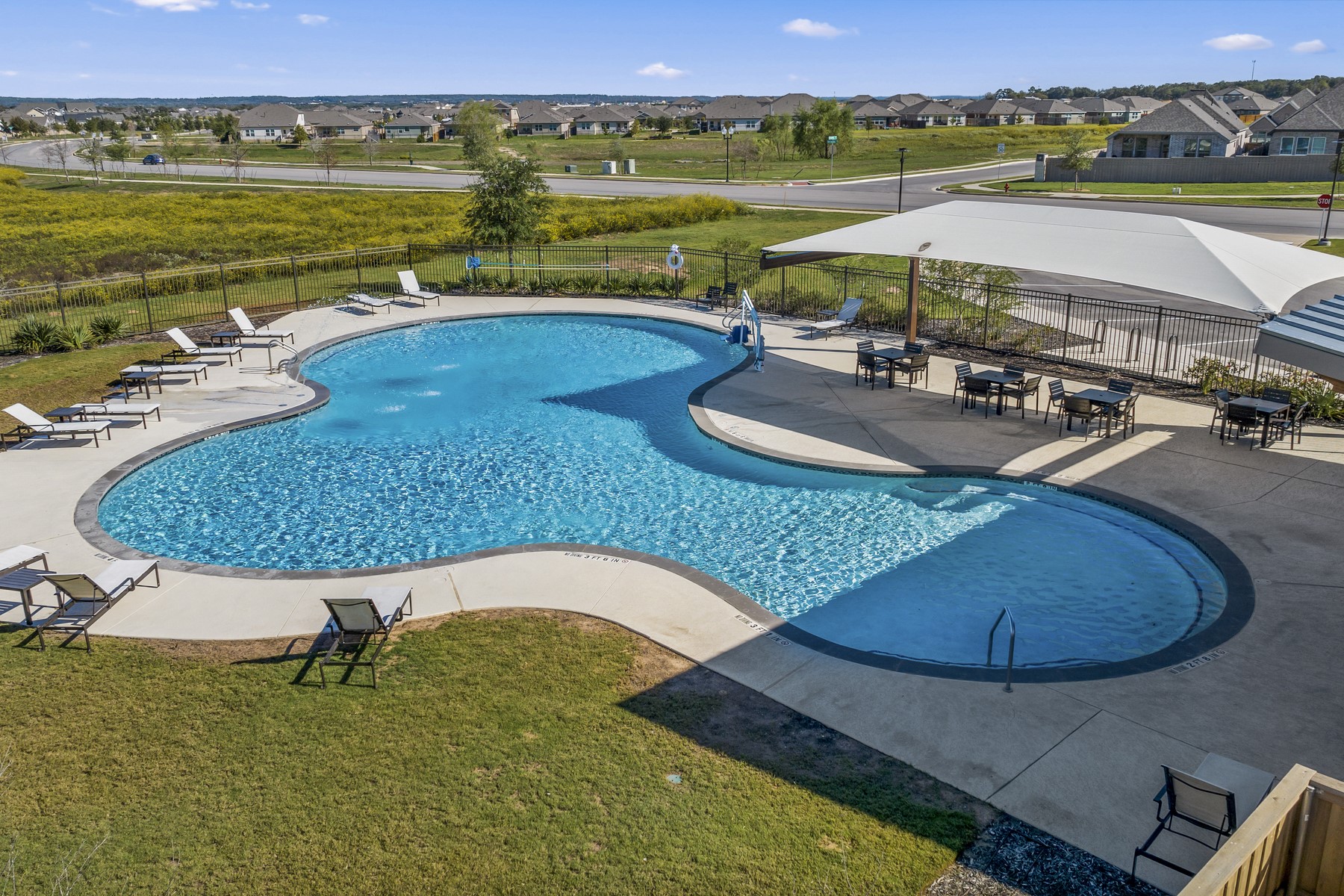 120 Periwinkle Lane Bastrop, TX 78602 - Photo 7 of 10 Beat the summer heat by taking a dip in the pool