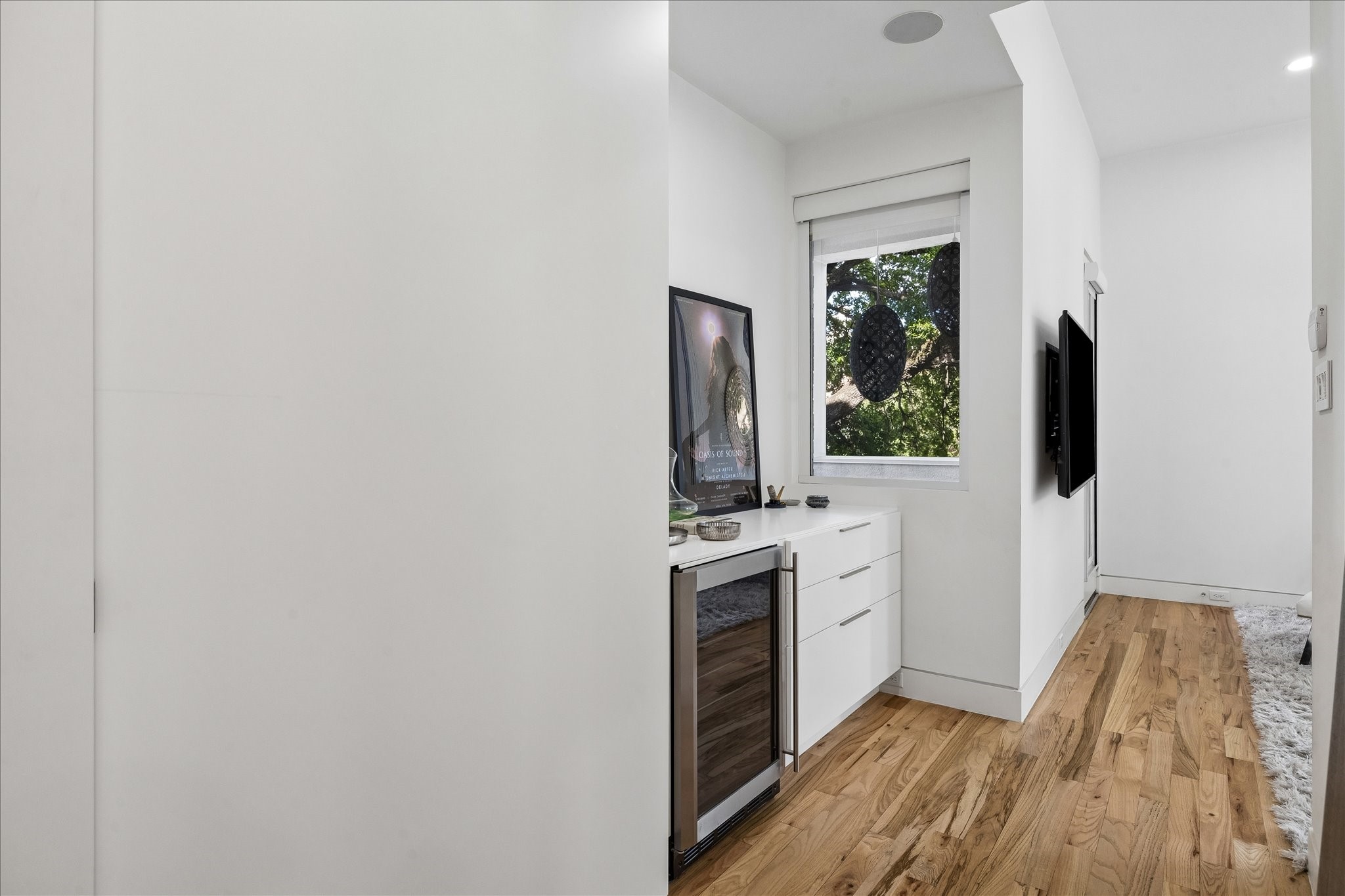 2014 Park Street Houston, TX 77019 - Photo 20 of 40 Recently added Italian closet and built in refreshment area off the master. Hardwood flooring is a perfect color.