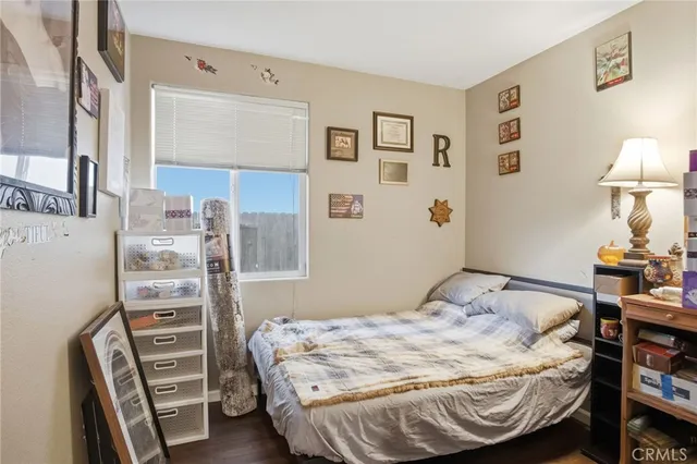 a bedroom with a bed and a closet