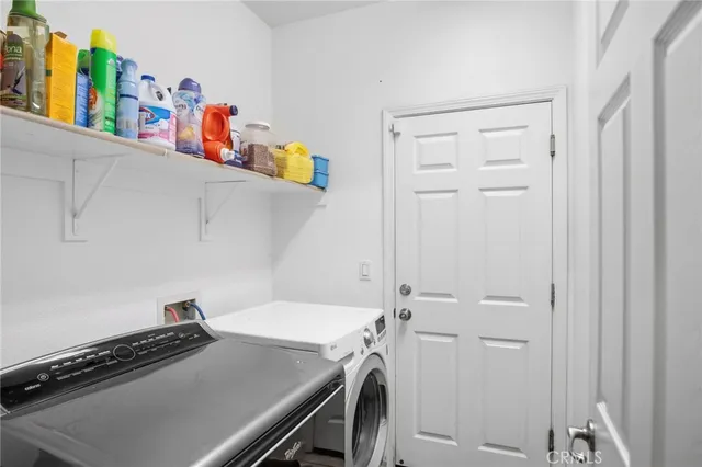 a bed room with a bed and a couch