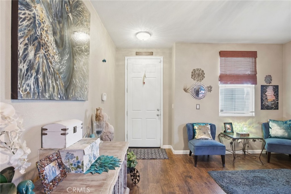 450 Beckman Way Merced, CA 95348 - Photo 5 of 22 a living room with furniture and wooden floor
